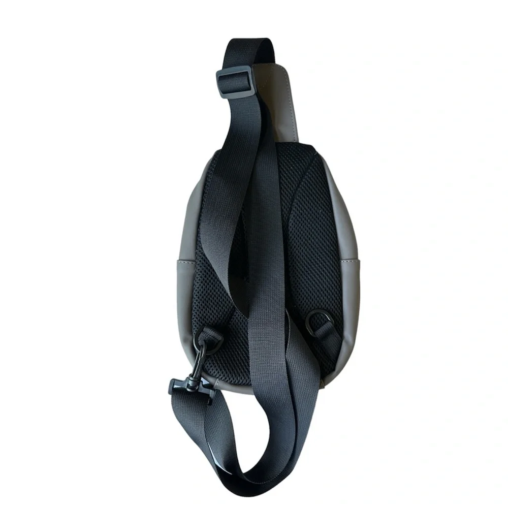 Duchamp Rubberized Sling Bag New
